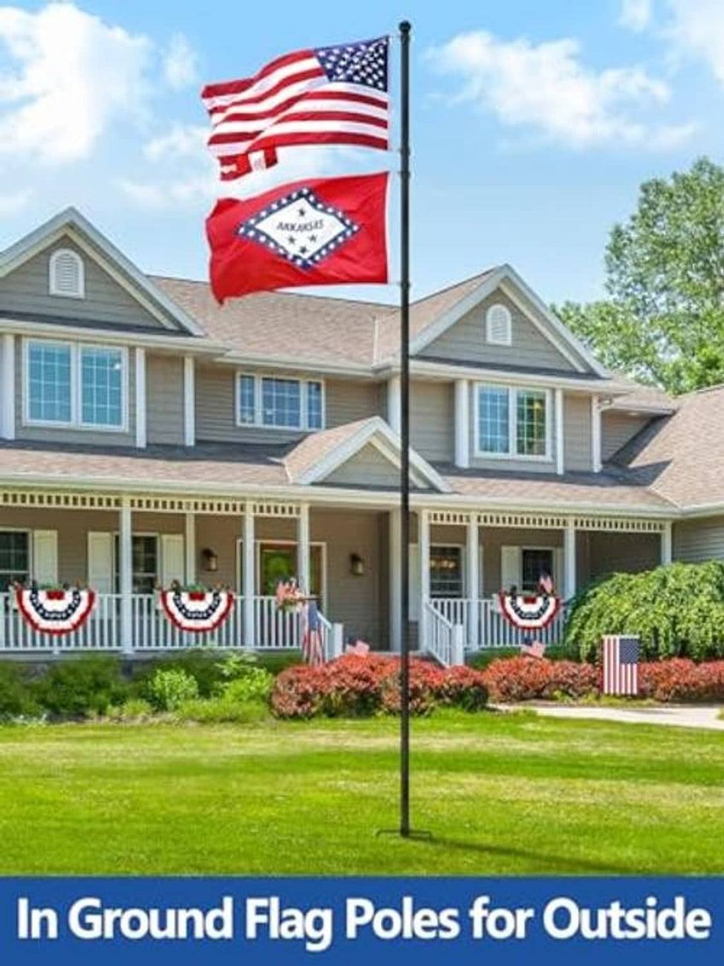 In-ground black flag pole with American flag in a yard in front of a home