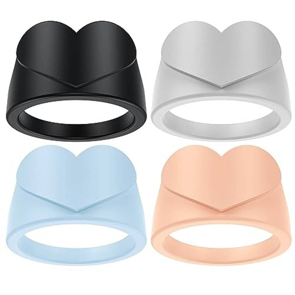 Set of heart-shaped silicone ring covers in black, white, light blue, and peach