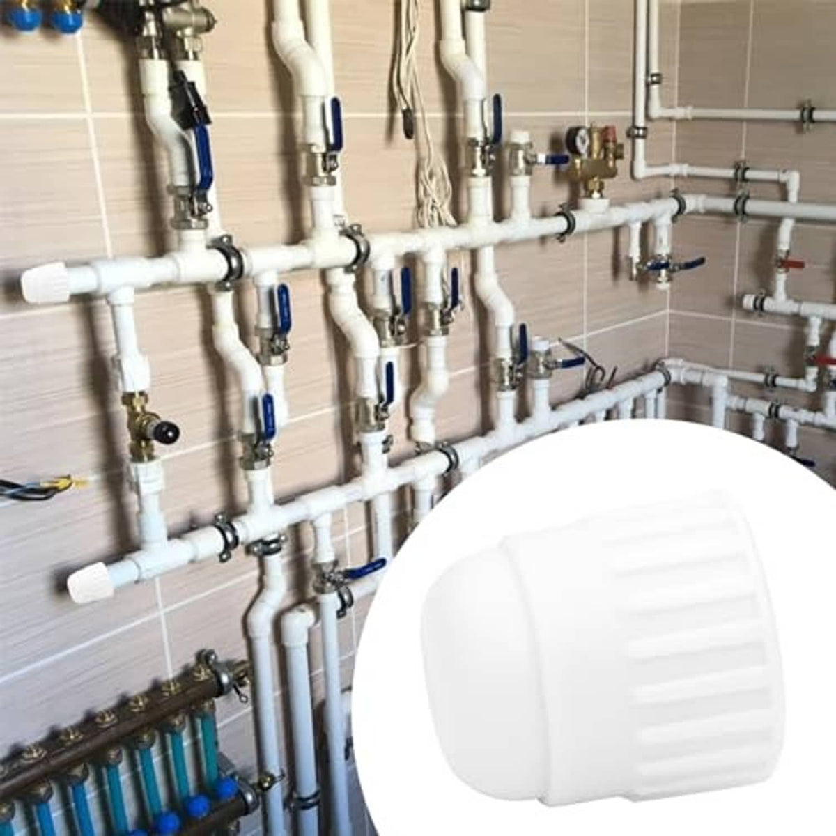 White PVC end cap plug for female-thread pipe, ridged grip on plumbing system