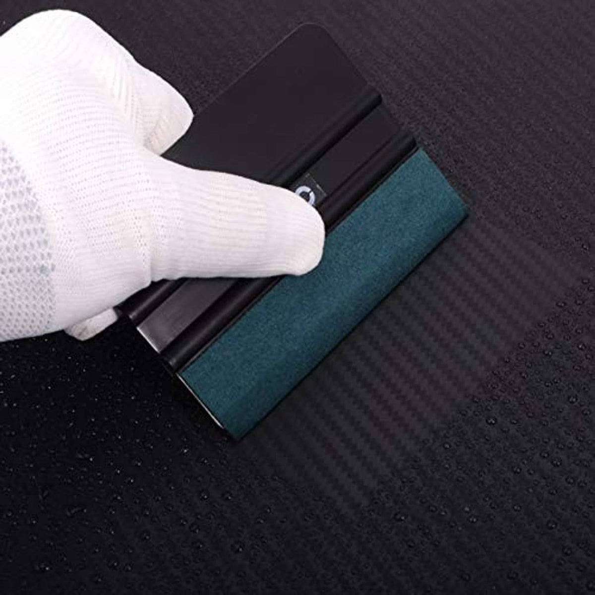 Microfiber suede felt squeegee with black frame and teal pad for smoothing vinyl wrap.