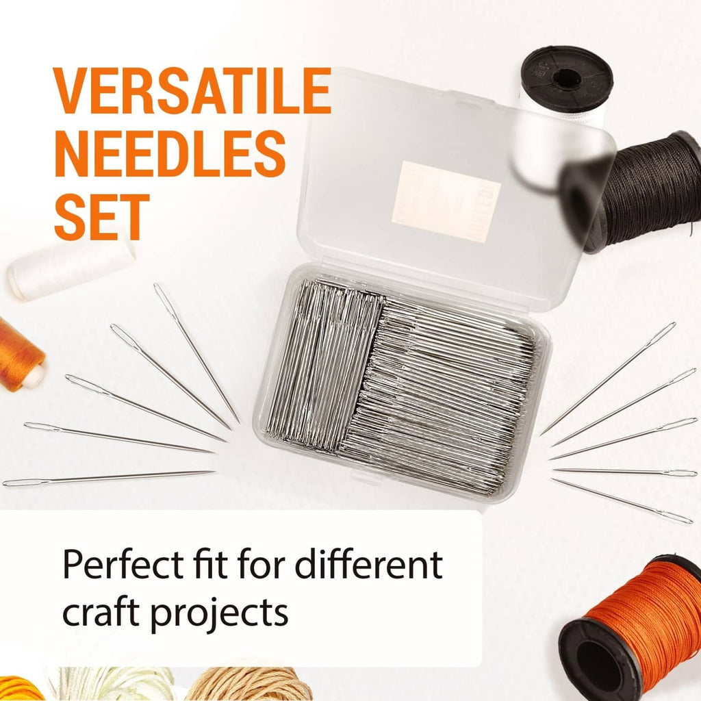 Large-eye sewing needles in clear case with loose needles laid around