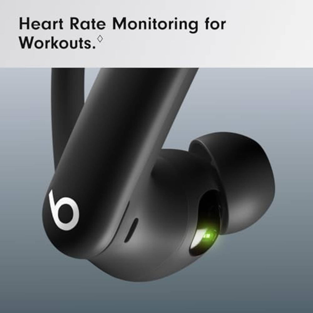 Black wireless earbud with green heart-rate sensor light and secure-fit earhook
