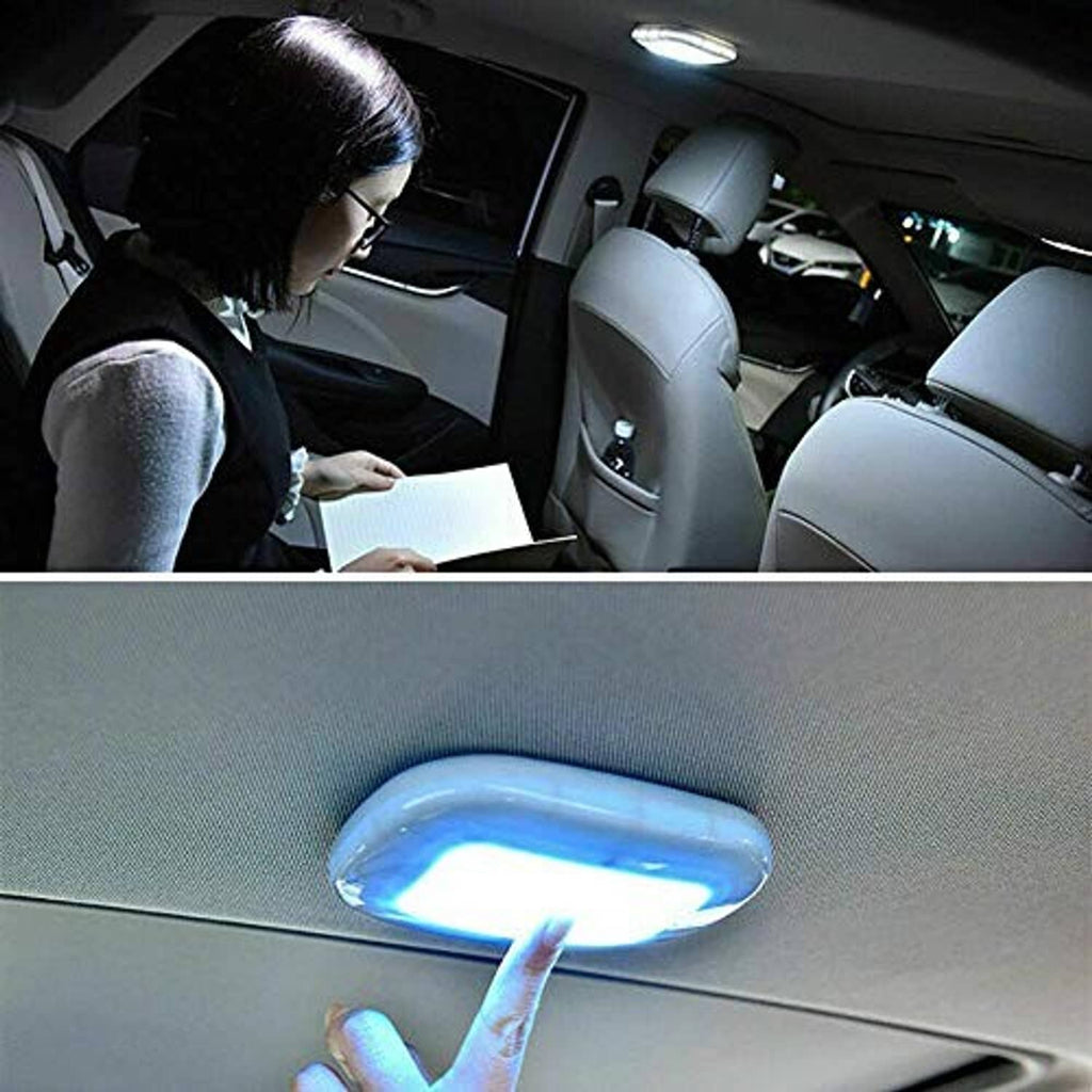 Car interior dome LED light switched on, illuminating front seats and cabin