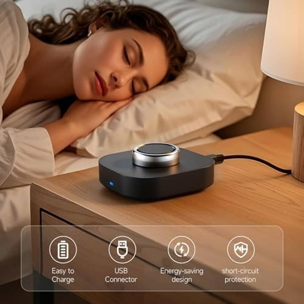 Black smart ring charging dock on bedside table with cradle top and cable