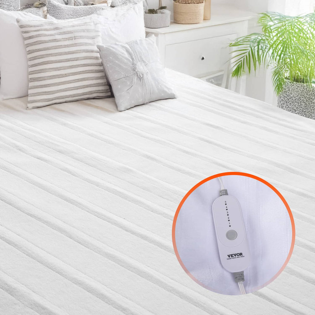 Heated mattress pad on bed with attached electric controller and cord detail