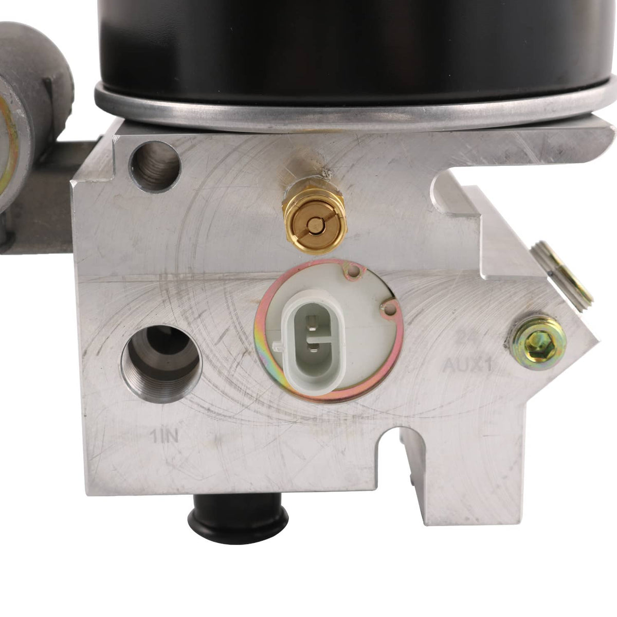 Air dryer housing close-up with connector plug, brass fitting, and mounting tabs