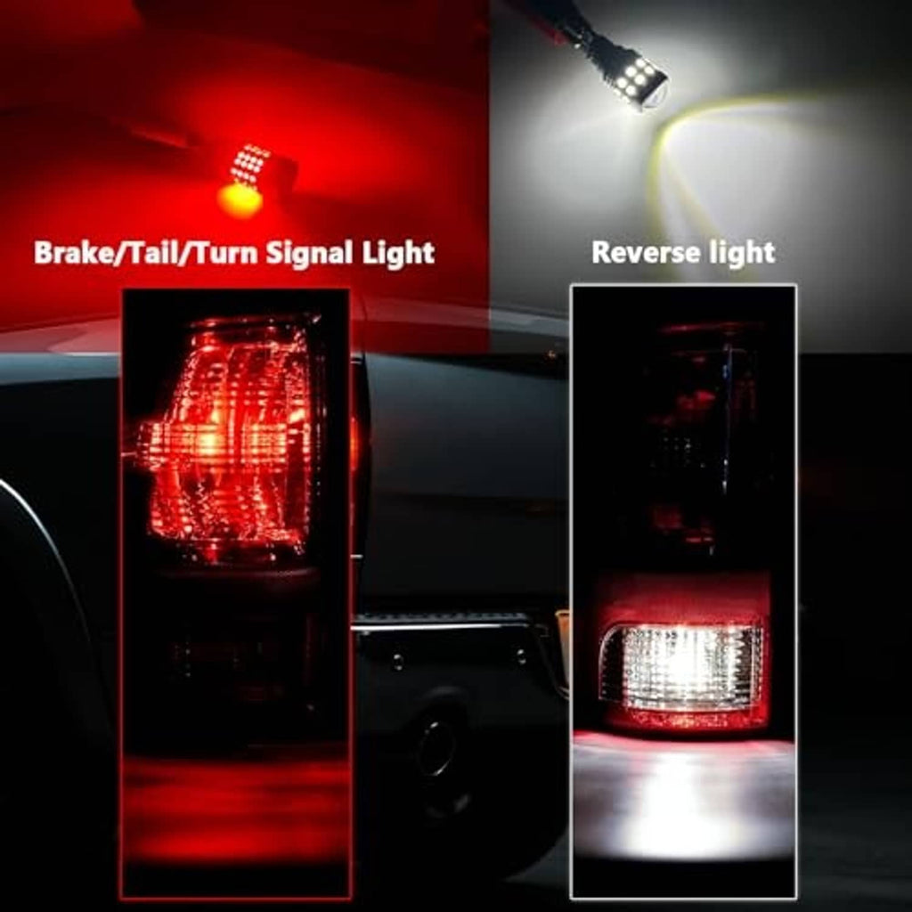 Rear LED bulbs lit in red brake/turn and white reverse, shown on a tail light housing