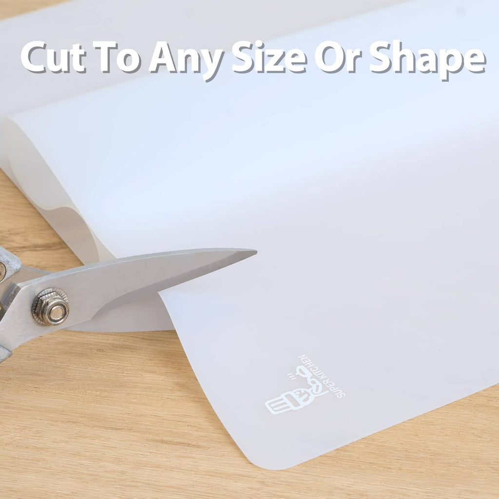 White translucent silicone counter mat sheet being cut to shape