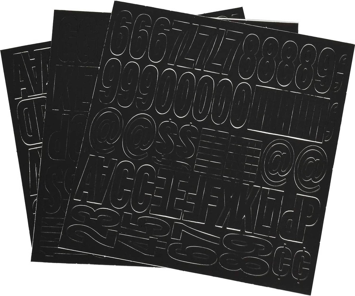 Black vinyl die-cut letters and numbers on multiple sheets, embossed outline designs