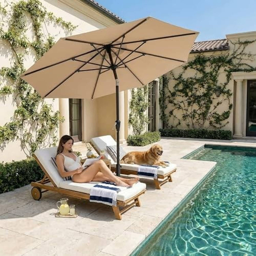 Beige patio umbrella over outdoor seating, open round canopy with cross ribs