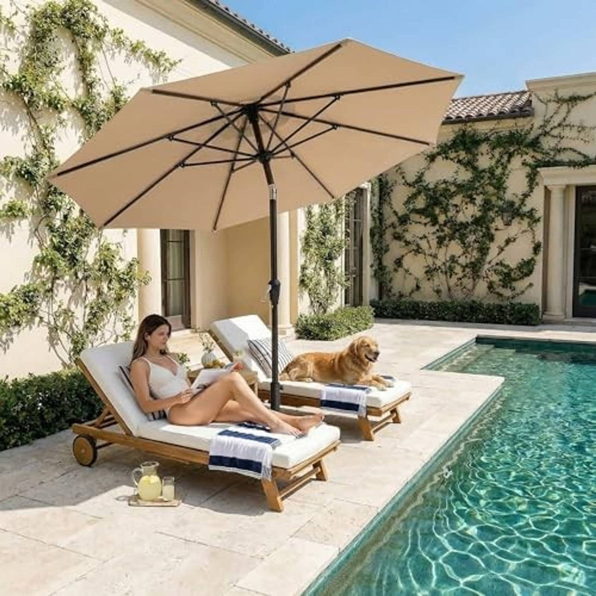 Beige patio umbrella over outdoor seating, open round canopy with cross ribs