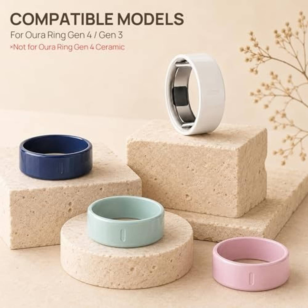 Multiple smart ring covers in blue, mint, and pink shown on stone blocks