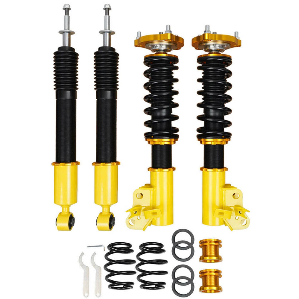 Complete coilover suspension kit set with four yellow shocks, black springs, and hardware