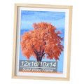 Natural solid wood picture frame with blue landscape and orange tree artwork