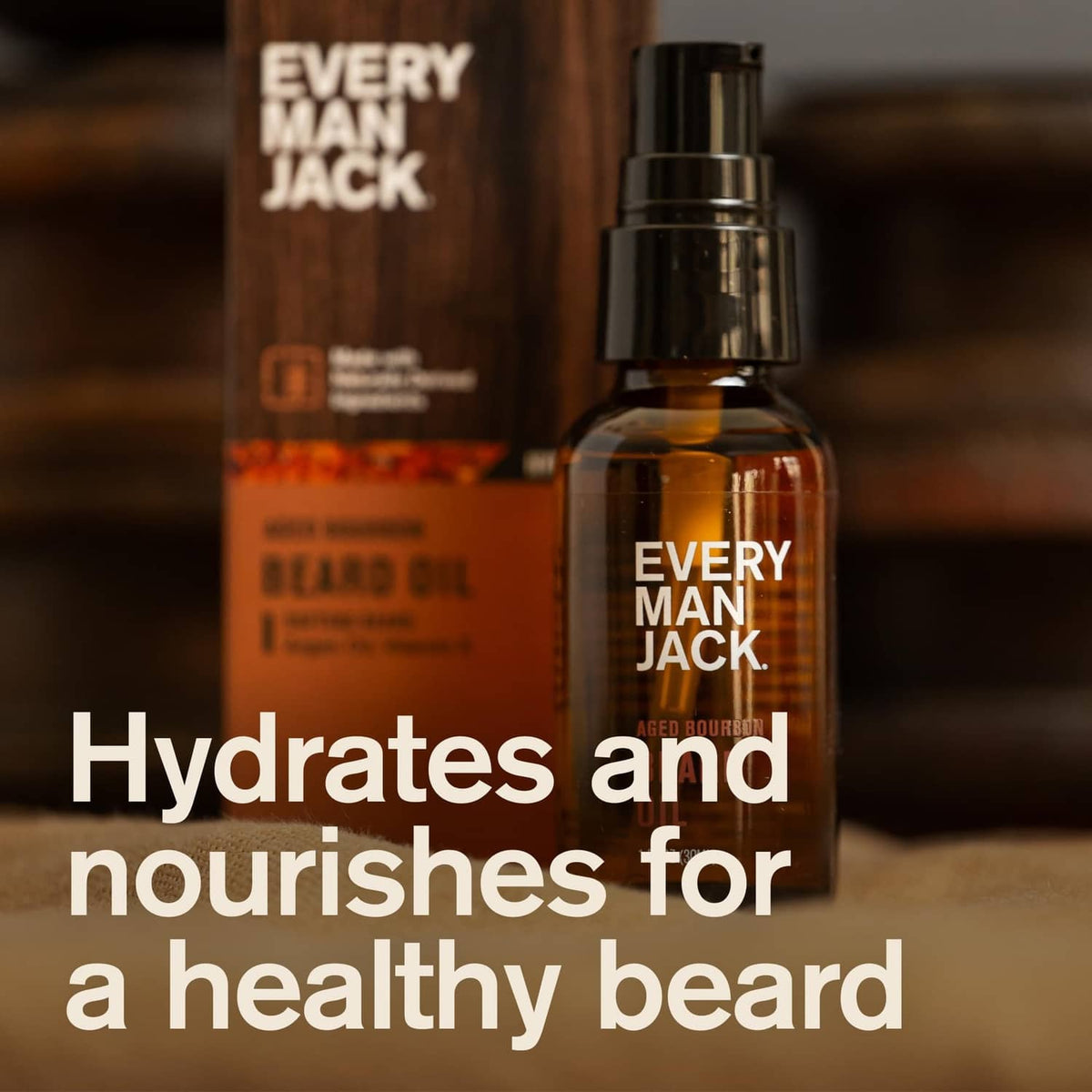 Every Man Jack aged bourbon beard oil bottle with pump, amber bottle and box