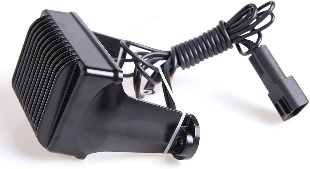Black voltage regulator rectifier with angled housing and attached wire harness