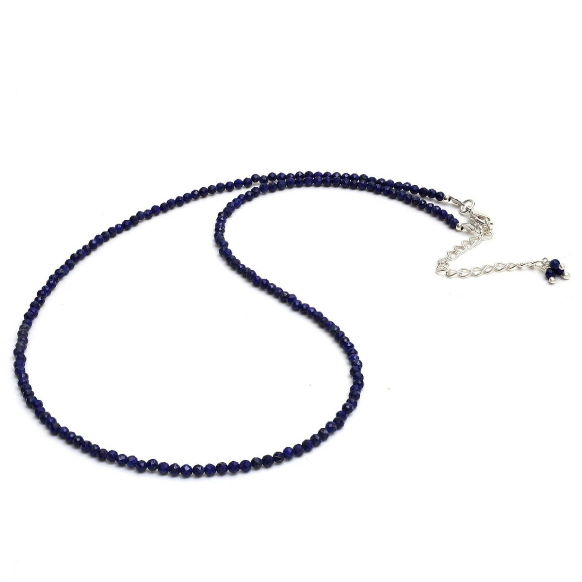 Lapis lazuli beaded necklace with silver clasp and blue bead end detail