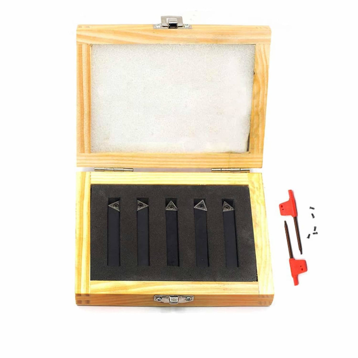 Lathe tool holder set in open wooden case with black holders, red wrench, and screws