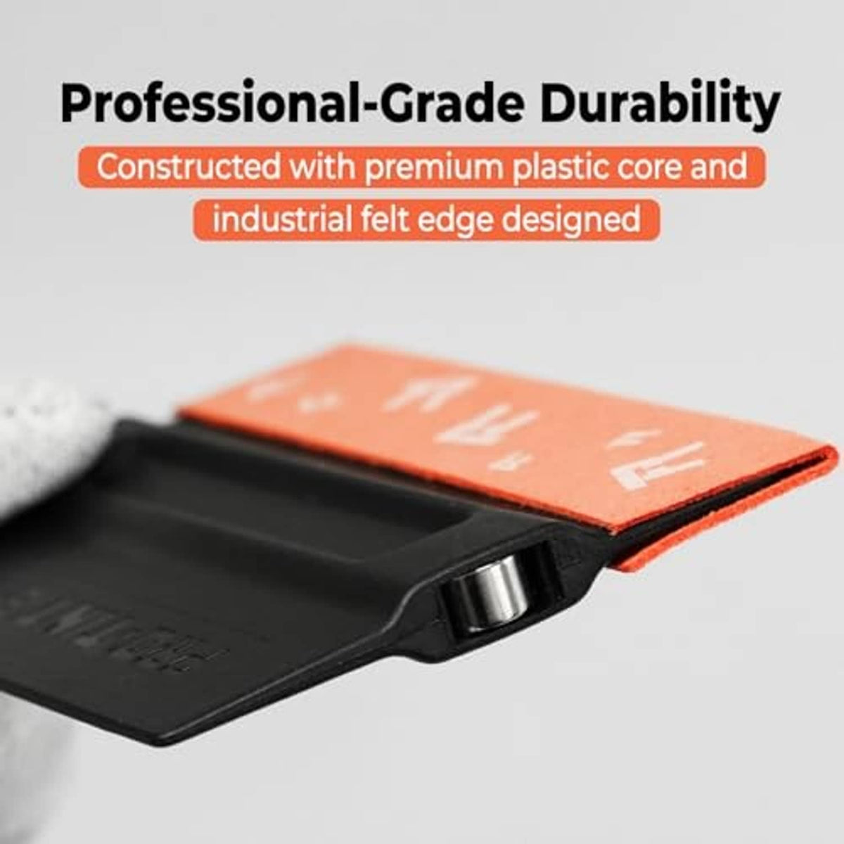 Orange and black squeegee with felt edge and durable black core, angled side view.