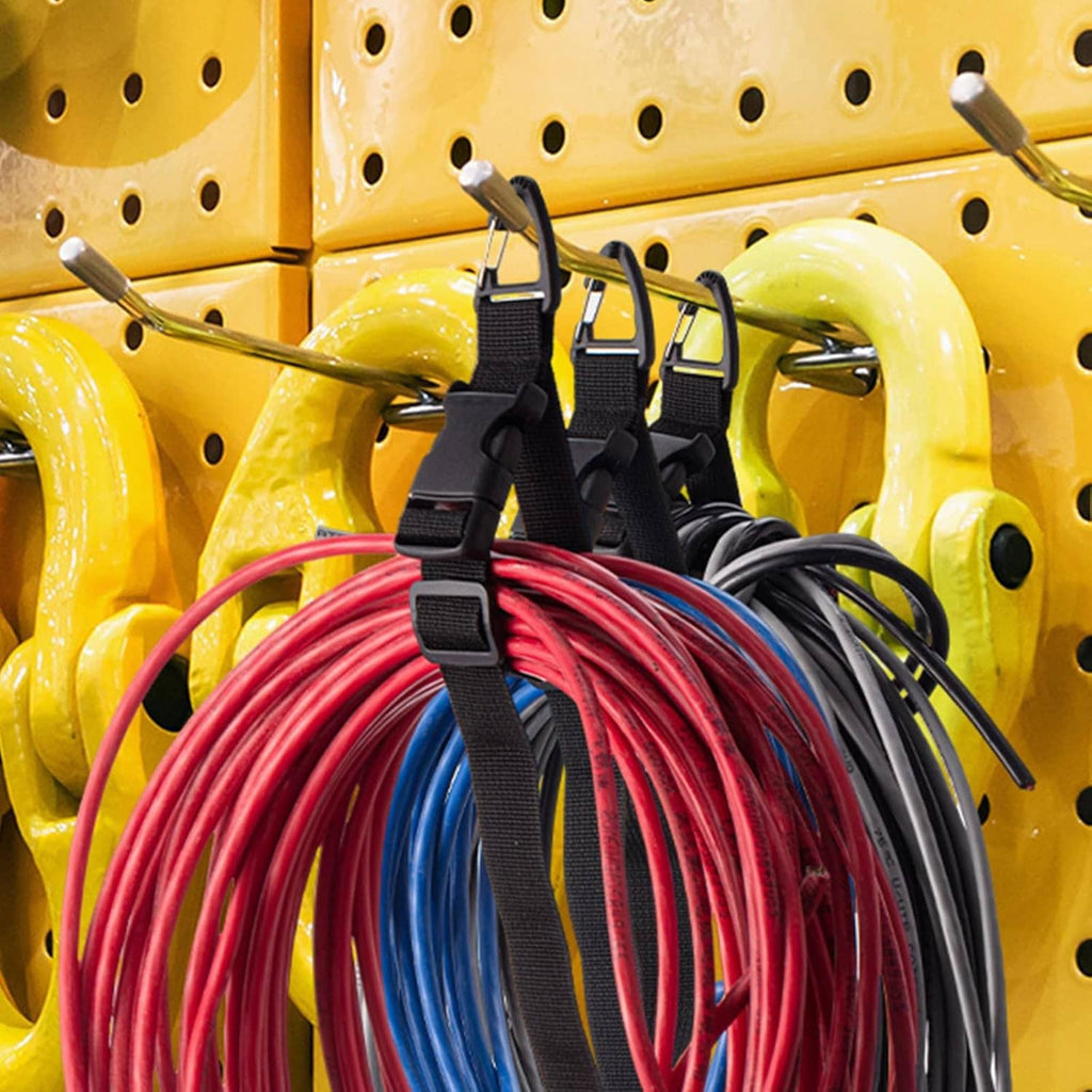Black triangle-clip straps bundling red and dark coiled extension cords