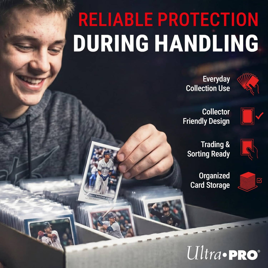 Ultra Pro clear card sleeves with trading cards arranged in an open box