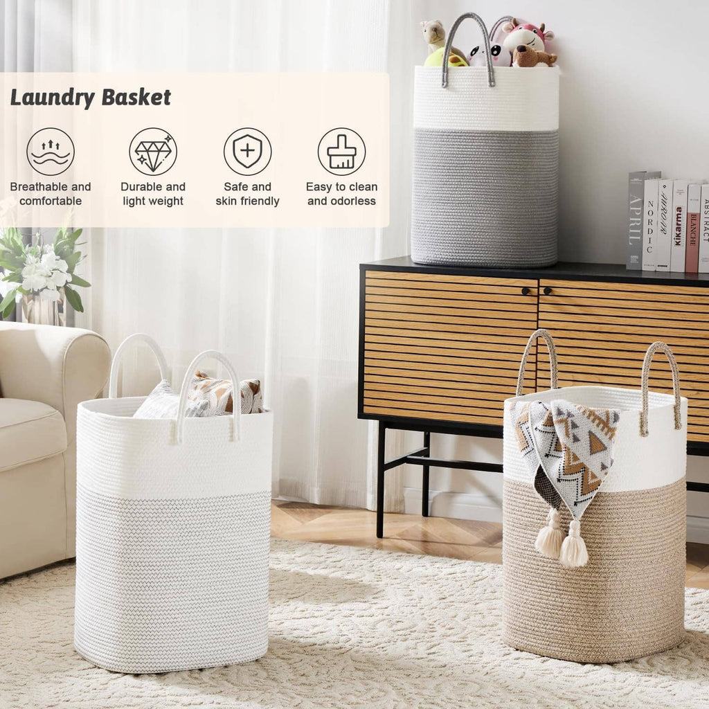 Two-tone woven cotton rope laundry basket with tassel charm, open top, and sturdy handles.