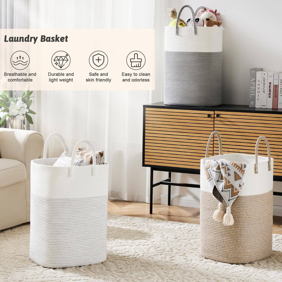Two-tone woven cotton rope laundry basket with tassel charm, open top, and sturdy handles.