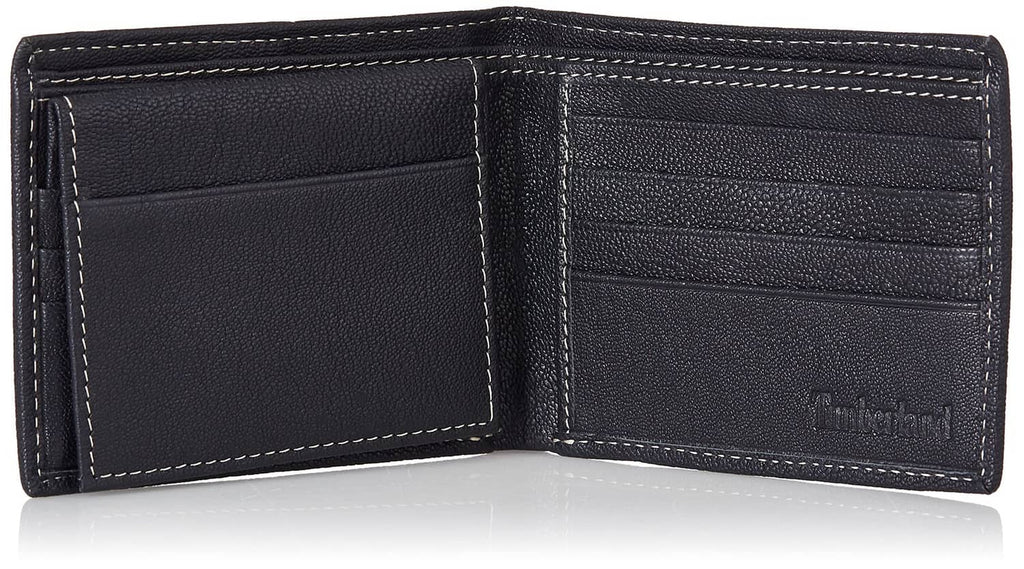 Navy leather bifold wallet interior with card compartments and embossed Timberland logo.