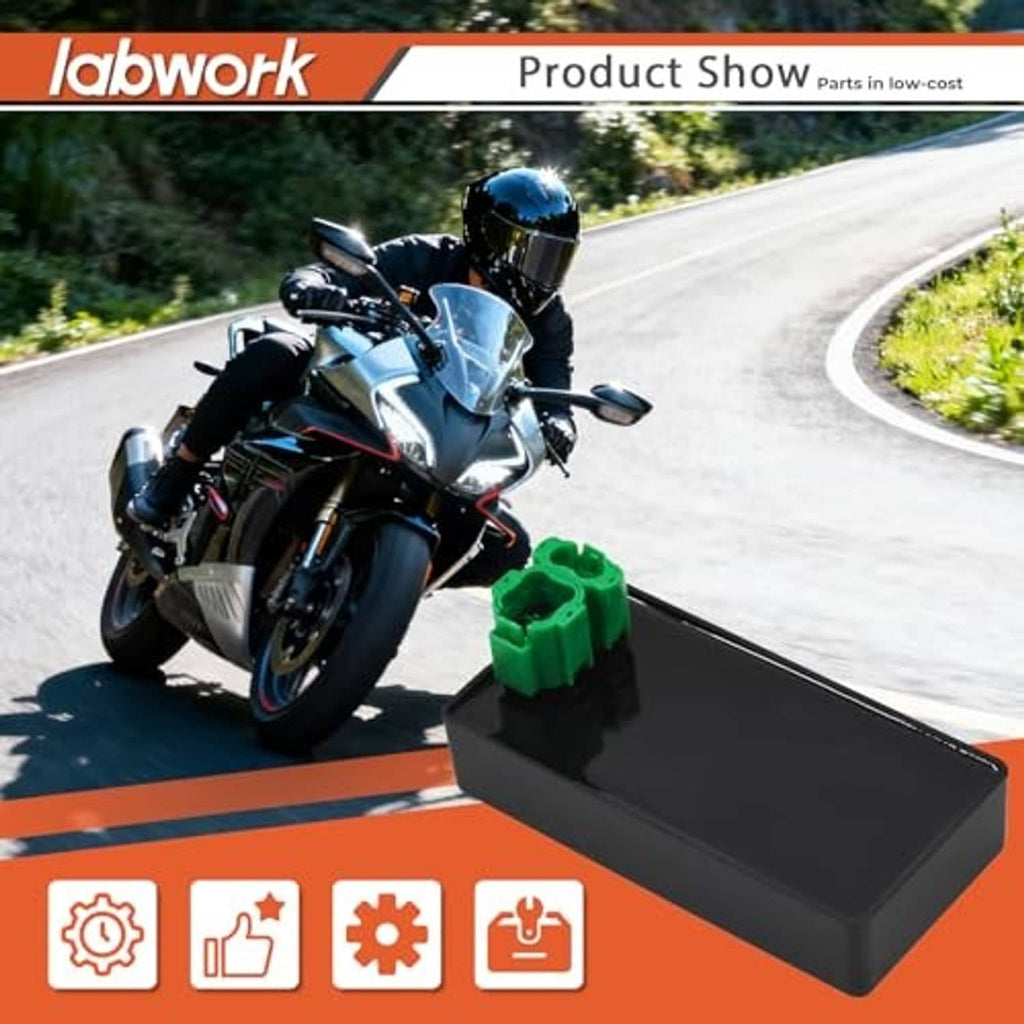 Black CDI module box with green connector block, angled view.