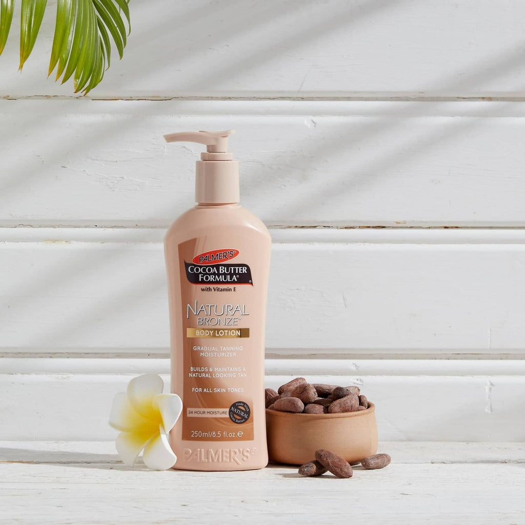 Palmer's cocoa butter body lotion bottle with pump, with cocoa beans