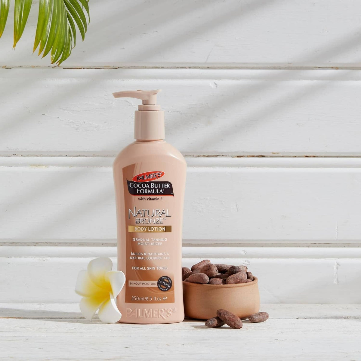 Palmer's cocoa butter body lotion bottle with pump, with cocoa beans
