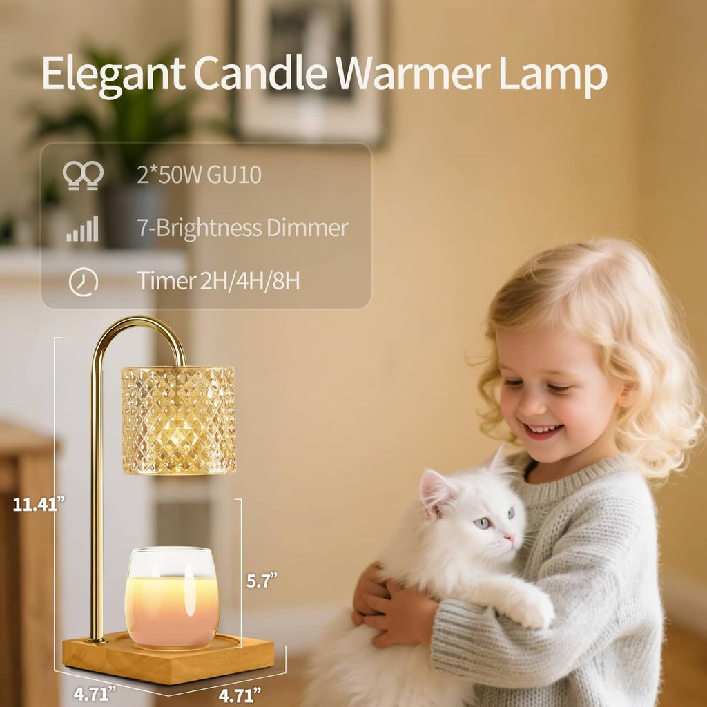 Candle warmer lamp with gold stand, amber textured glass shade, lit candle on wooden base