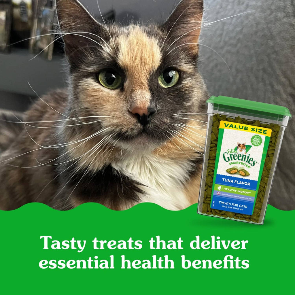 Greenies Smartbites tuna-flavor cat treat container beside a calico cat