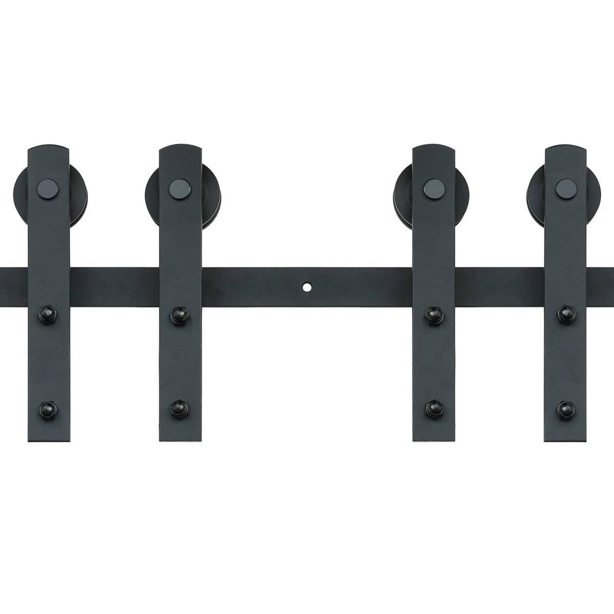 Black barn door track hangers with round roller wheels on a mounting rail
