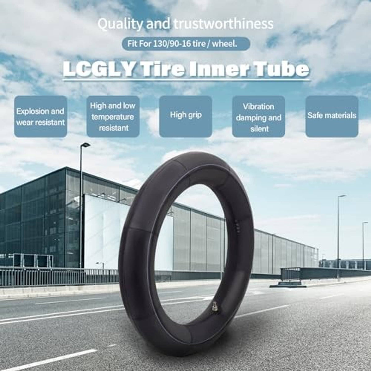 Black inner tube with valve stem, upright standing view