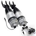 Pair of front air suspension shock struts with silver air springs and black mounts