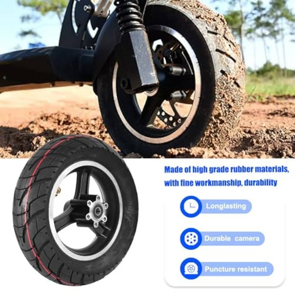 Scooter wheel tire with hub, black rubber with red tread lines, on asphalt