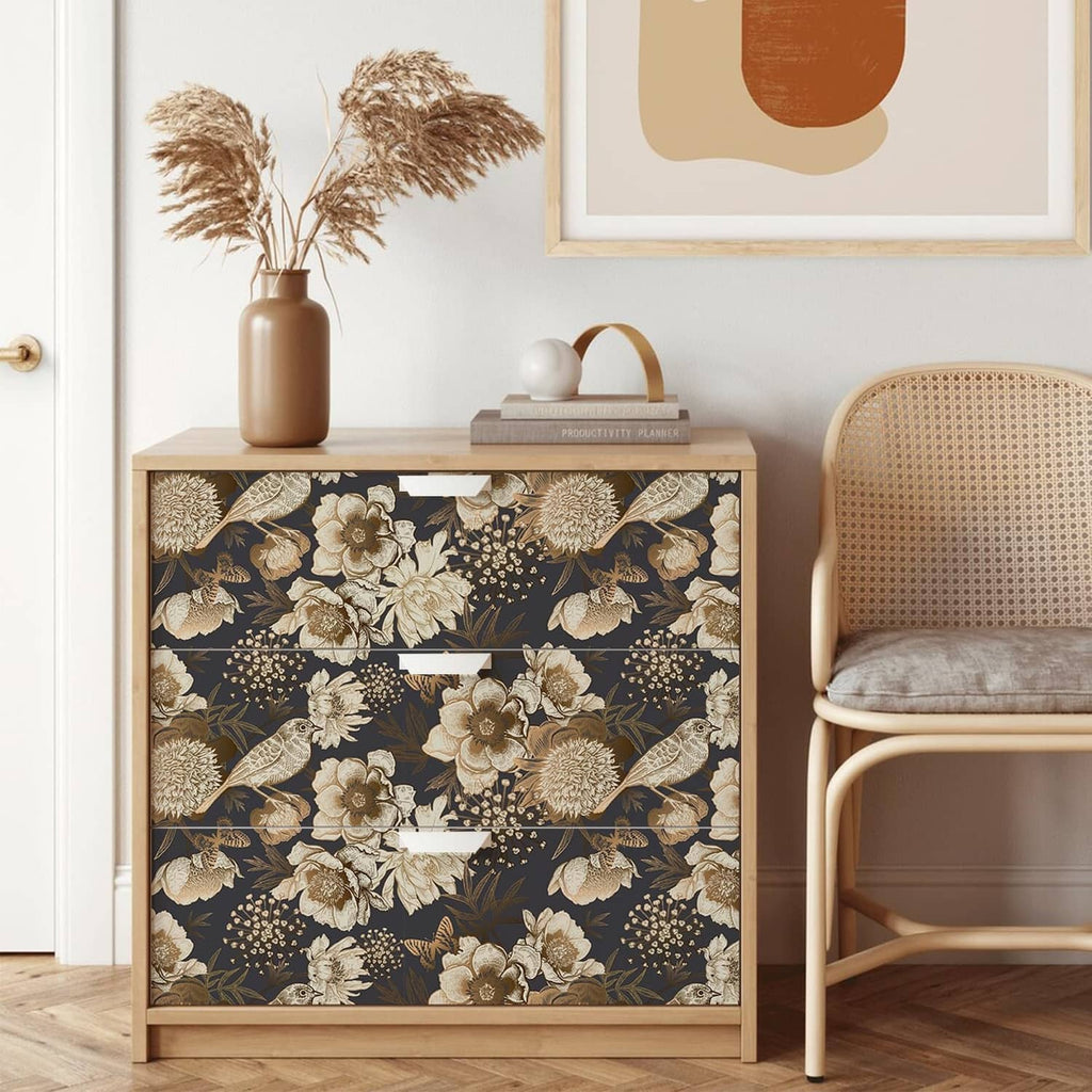Black and gold floral bird wallpaper on cabinet side wall