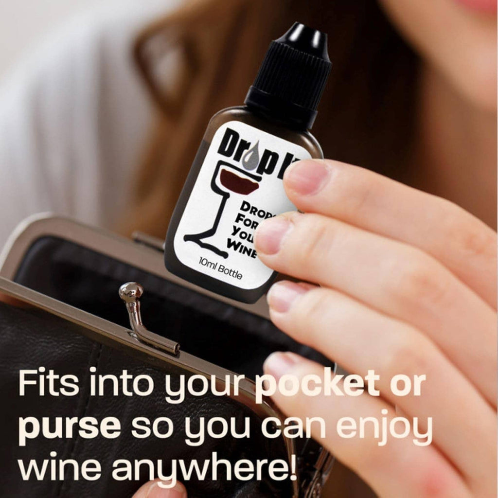Drop It 10ml bottle with dropper tip held in hand, pocket-size wine drops