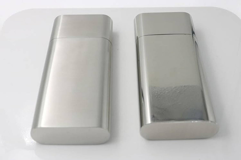 Stainless steel cigar case with smooth rectangular body and rounded ends