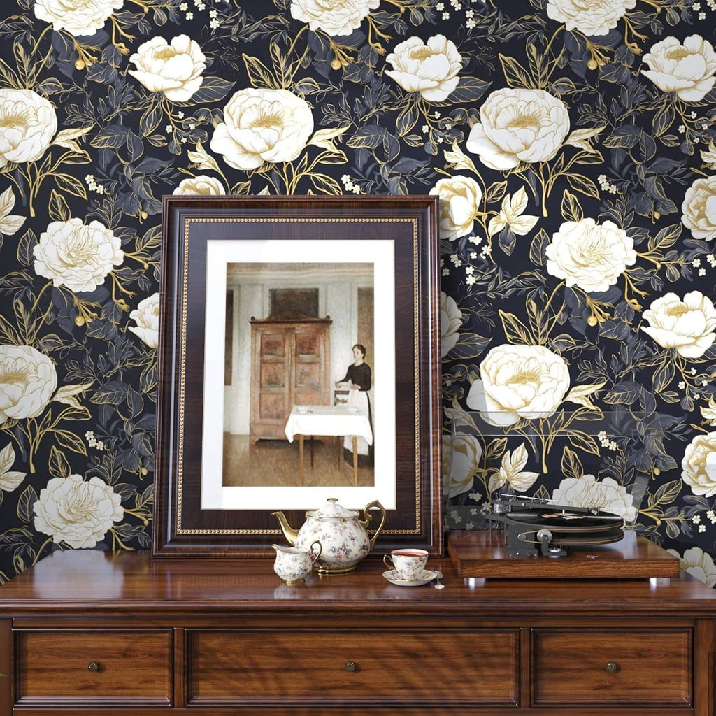 Floral wallpaper pattern roll showing white peonies and gold foliage on dark blue