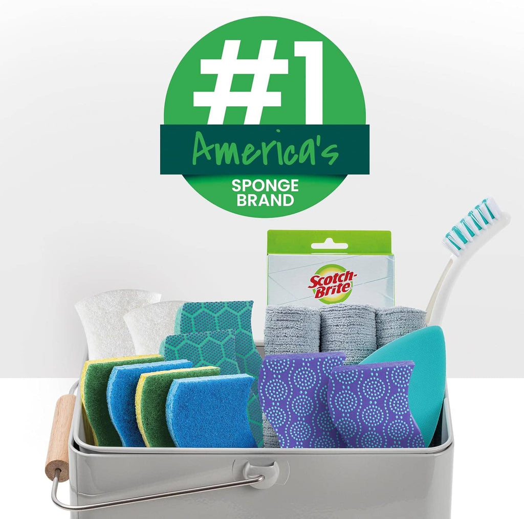 Assorted scrub sponges in a metal caddy with retail box packaging.