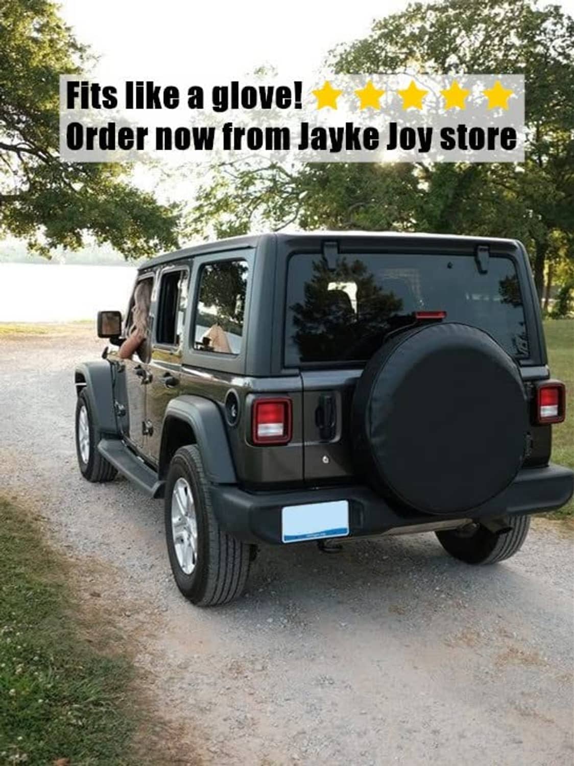 Spare tire cover on SUV rear spare, round black cover covering the full wheel