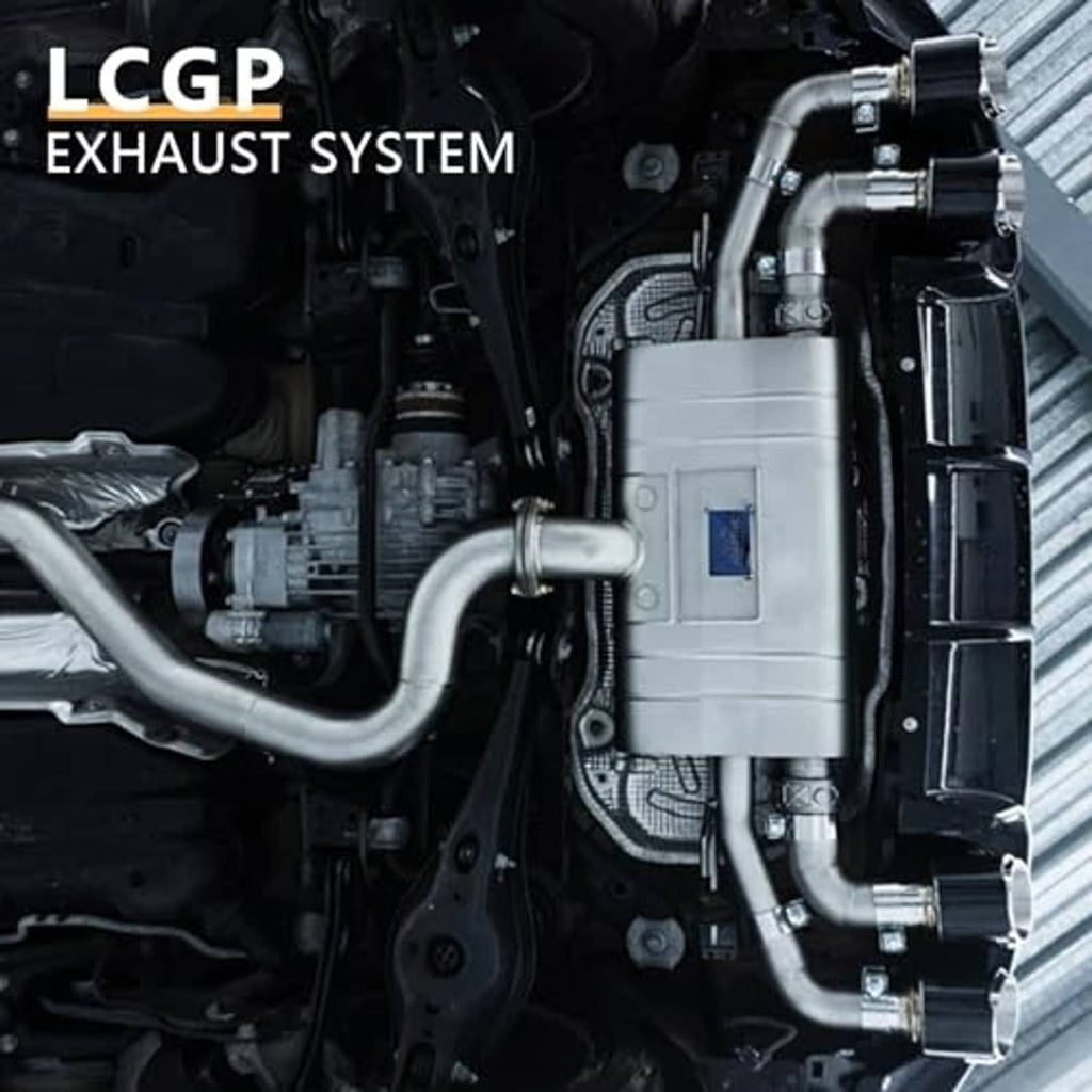 Silver exhaust pipe tube mounted in an engine bay, smooth bore opening