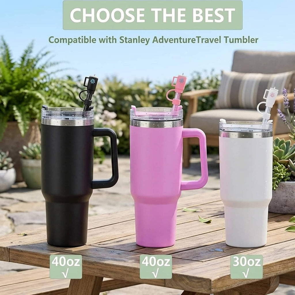 Glitter replacement straws with flower covers on 40oz tumbler cups, assorted colors