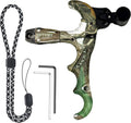Camouflage compound bow thumb release with black trigger button and safety lanyard.