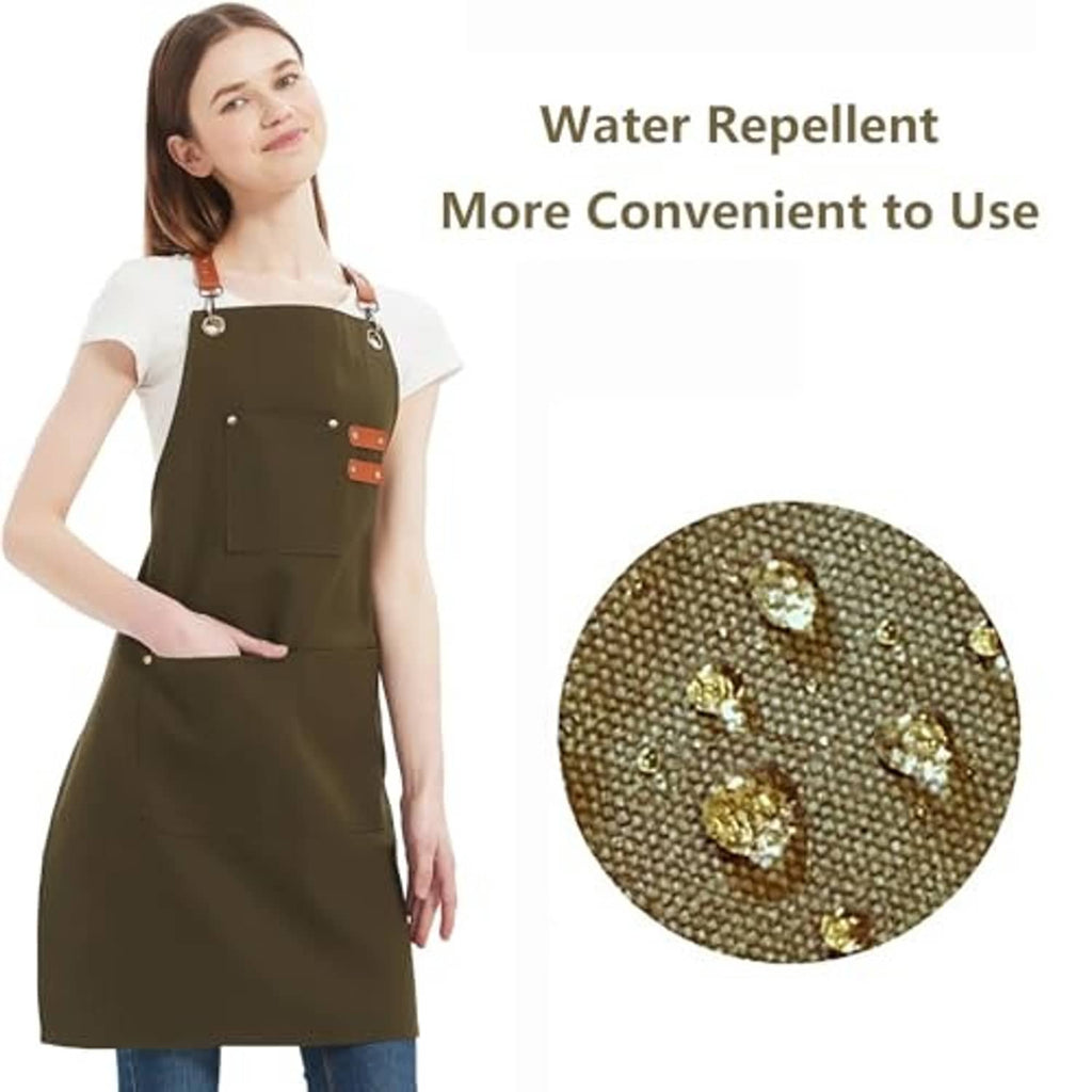 Olive green chef apron worn on model, with large front pocket and smaller slots