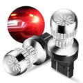 Pair of red LED strobe brake light bulbs with metallic housings and black bases