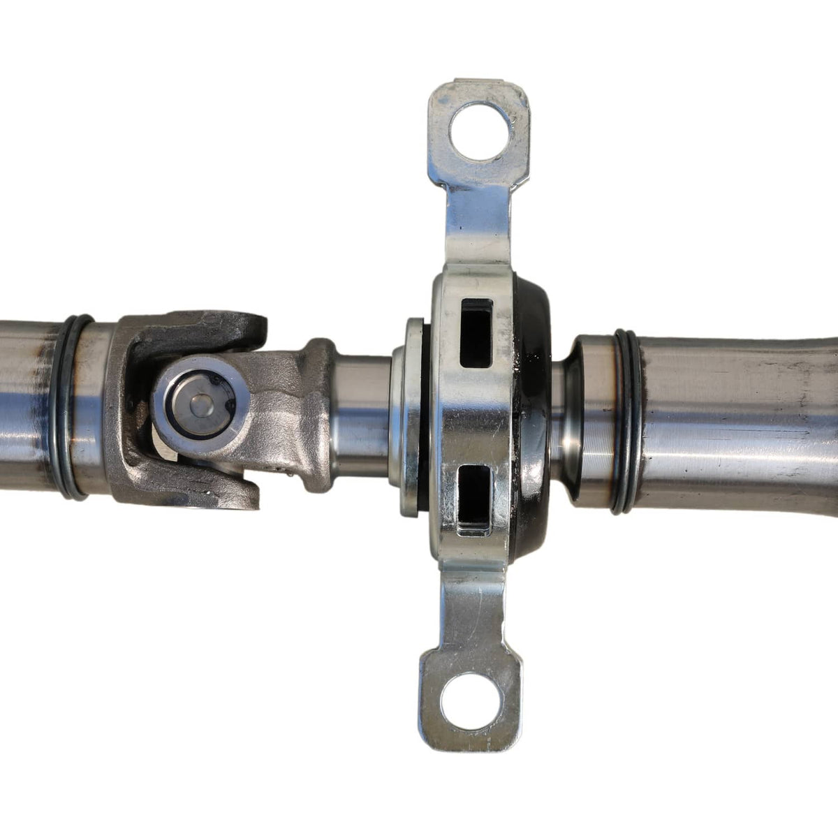 Rear driveshaft prop shaft U-joint carrier with black boots and steel yokes