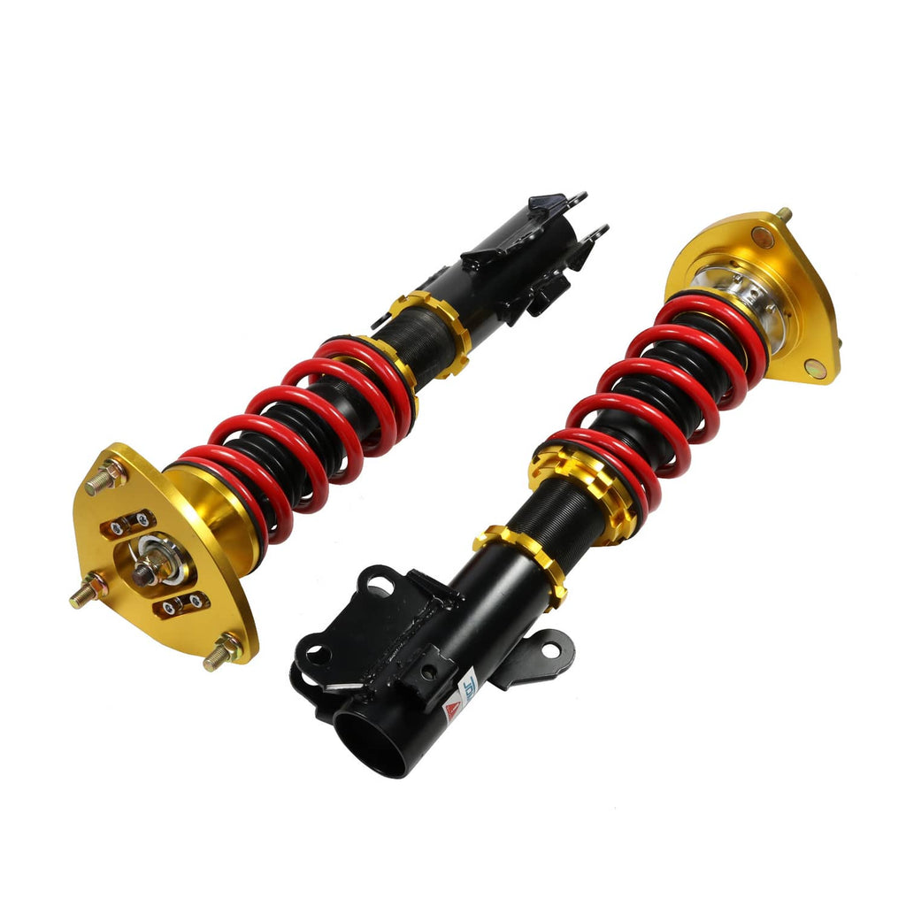 Coilover shock pair with red springs, gold plates, and black dampers